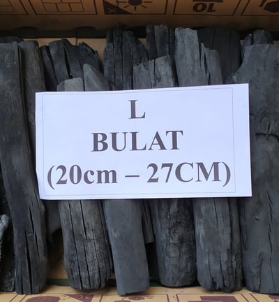 a box of black and white paper with a sign that says bullat