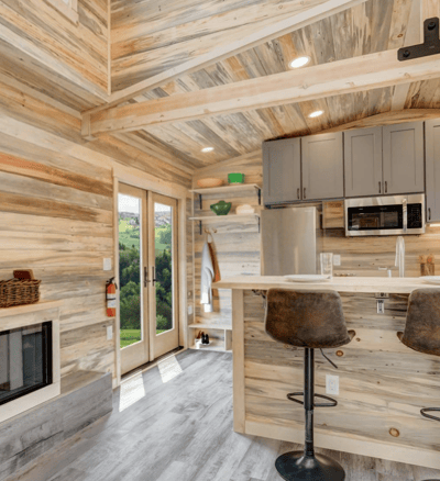 Rustic kitchen interior of modern tiny home on wheels