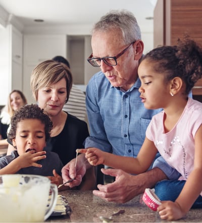 Grandparents & grands baking cookies in the kitchen