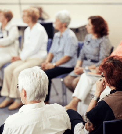 A group of people at a meeting