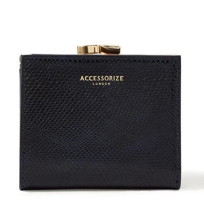 a black purse with a gold clasp and a gold clasp