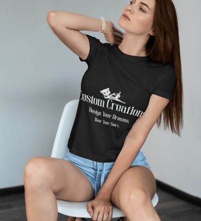 a woman sitting on a chair with a black shirt