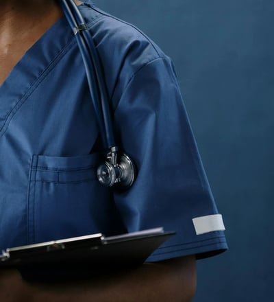 a dentist in blue uniform