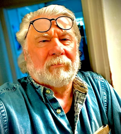 Headshot of Jude MacAllen Tatman