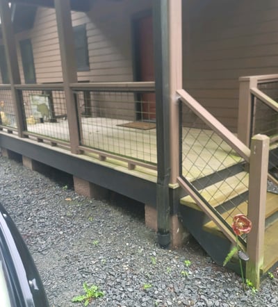 Porch with old boards, full of grime, and rust. Porch has been damaged overtime. McDowell County