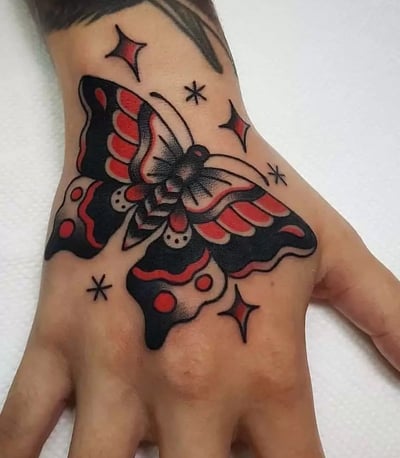 butterfly hand tattoo