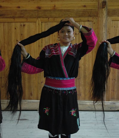 traditional long haired women at Huangluo Yao Village, China