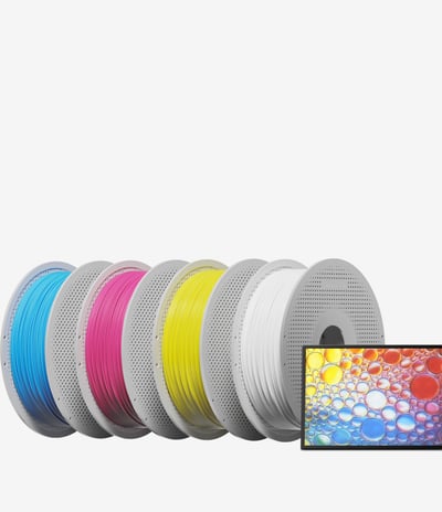 a group of four different colored spoolies for 3d printing