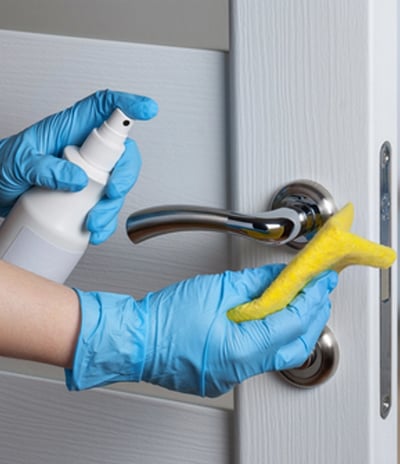 Sanitizing high touch areas within the work place.