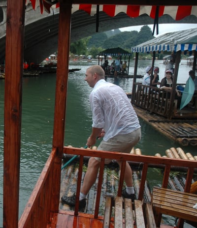 Nick Billington having a water fight at the  Yulonghe scenic area, near Yangshuo, China