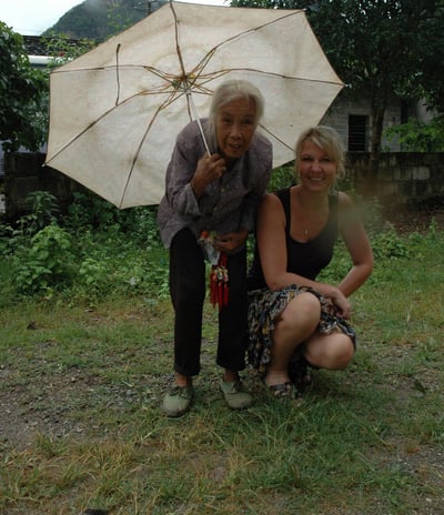 old lady at traditional farm in Yangshuo County, near the river Li, China