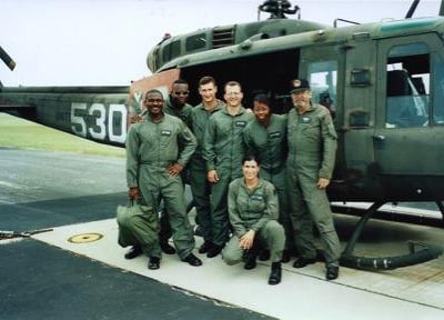 Dr. Clayton Lawrence with his comrades demonstrating teamwork, service, and dedication to duty.