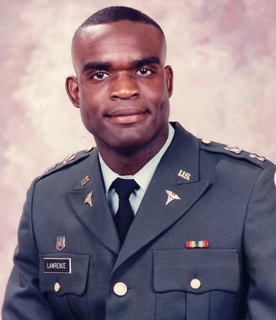 Dr. Clayton Lawrence in U.S. Army uniform, military flight surgeon, dedicated veteran  and leader.