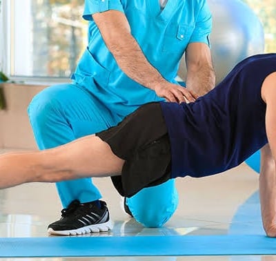 Manual physiotherapy for back pain recovery by expert therapist at home.