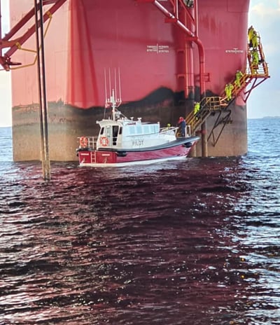a boat is docked in the water