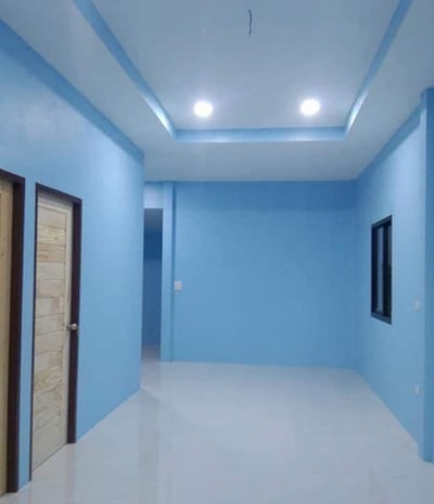 Finished hallway with painted walls and drywall ceiling with recessed lighting by Garnet Painting & Remodeling GA