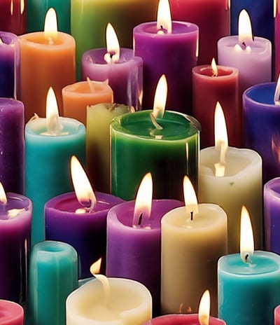 lighted candles on black surface