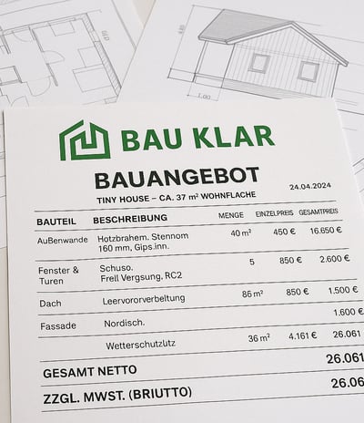 a paper house with a price tag on it