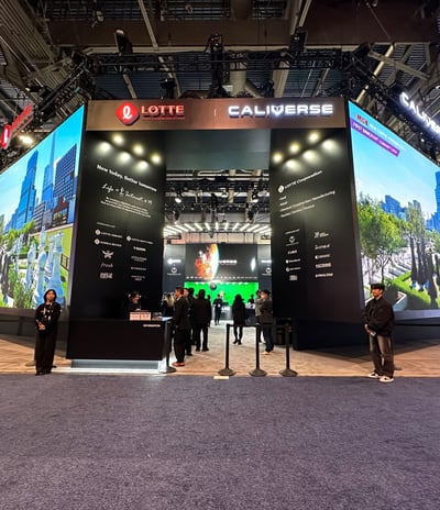 a booth with a large display of a video game