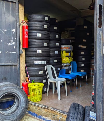 michelin tyres stacked in front of the tyrepublic tire shop in nigeria
