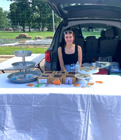 Claire at a farmers market in North Mankato