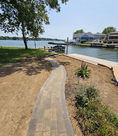 Custom sidewalk to the lake in Heritage Lake