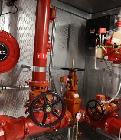 a fire hydrant with a red fire hydrant and a red fire hydrant
