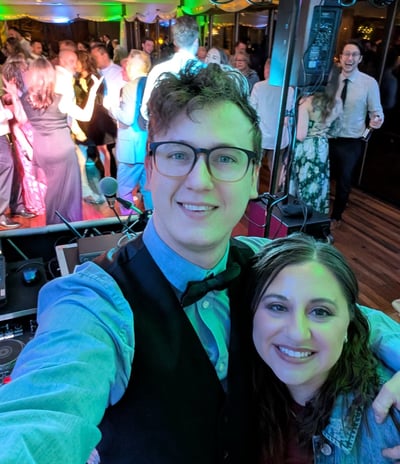 wedding DJ selfie with packed dance floor