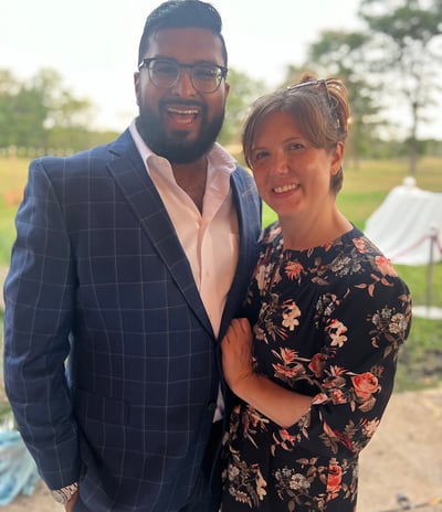 a man and woman standing next to each other