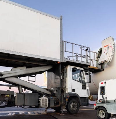 Airline Catering truck servicing aircraft