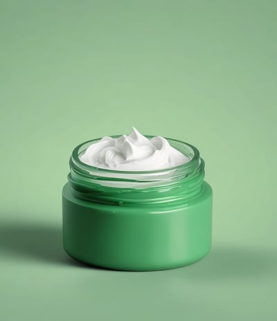 A green cosmetic jar with a minimalist design, featuring the letter 'C' prominently on its front. The jar appears to be floating against a solid green background, creating a sense of simplicity and elegance.