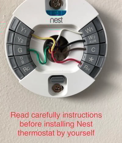 Nest Thermostat Installation photo with message in red to read instructions before installing thermostat by yourself