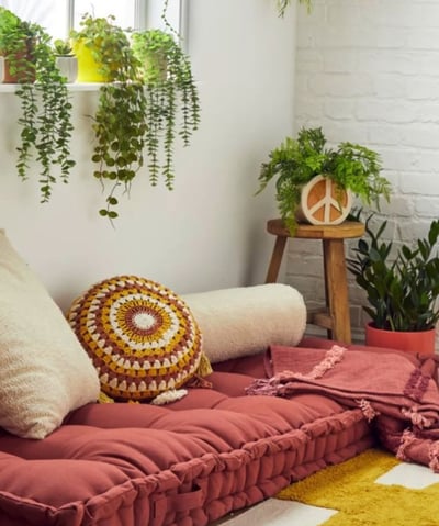 a living room with a couch and a rug