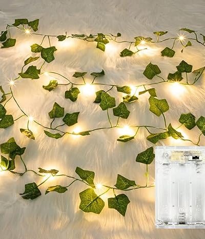 a white light bulb string lights up in a room