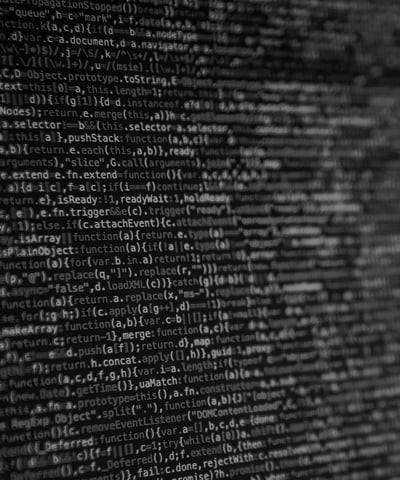 a wall of text on a wall with a black and white background