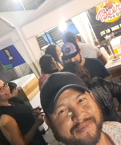Jose Moreira having a beer with friends