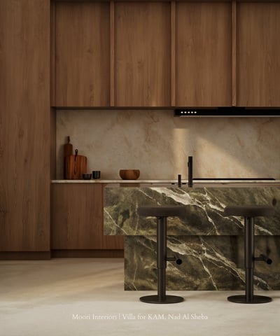 Wood cabinetry and a patterned green marble island in a contemporary kitchen.