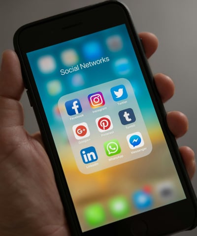a mobile shone showing the list of social media icons