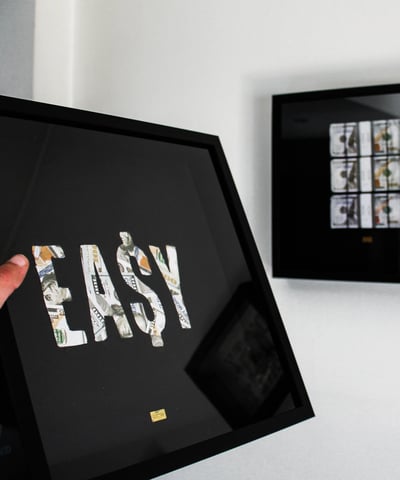 A PICTURE OF A MONEY FRAME FOR MOTIVATION