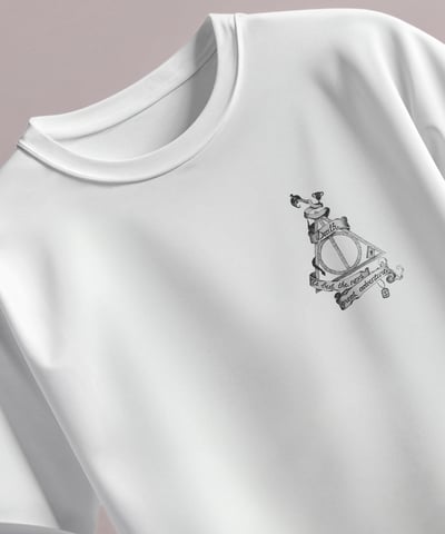 a white t - shirt with a cat on it herry poter