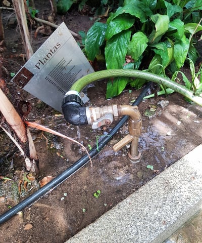 a hosepiper with a hose attached to a hose