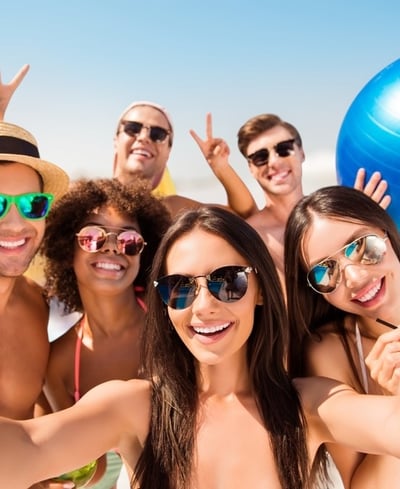 Group of friends enjoying a private Vegas dayclub tour with drinks and poolside fun