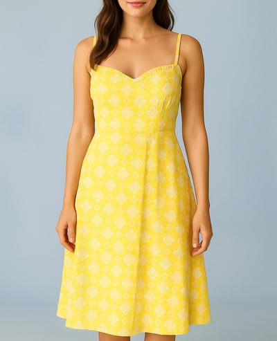 a woman in a yellow dress with a white dress