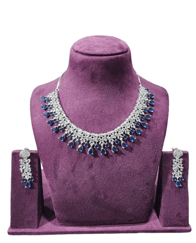a purple necklace and earring set with a necklace and earring