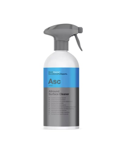 Flacon de 500 ml de produit nettoyant pour surfaces, avec étiquette et spray intégré.