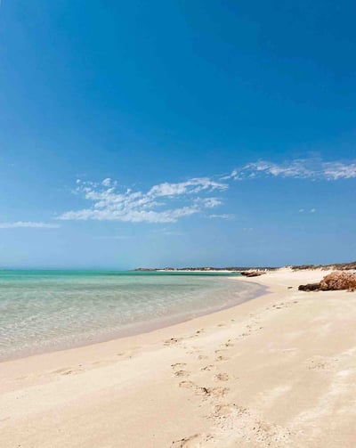 Beautiful Sand Beach with white sand and clear water near Exmouth, Western Australia.