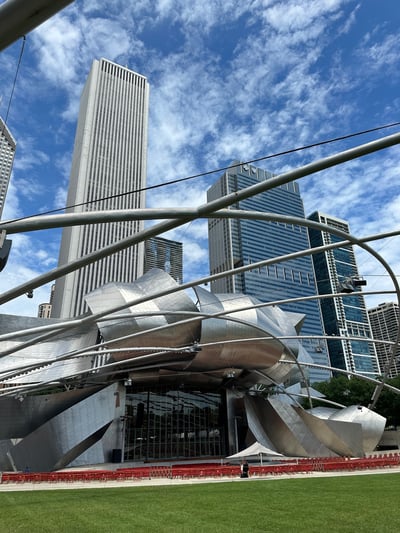 A large frame structure in front of a metal stage