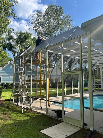 Rescreening a pool enclosures in Murrells Inlet, SC.