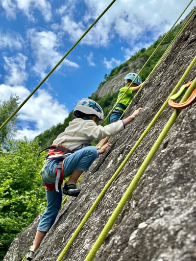 Kids experiencing rock climbing in Sasso Remenno area.