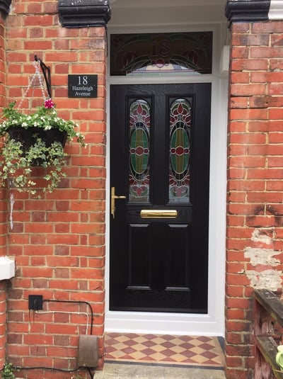 new black front door with bespoke glass which was fitted in Woolston, Southampton by Buildmydoor